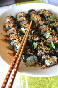 High angle view of sushi with chopsticks in plate