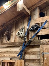 Low angle view of clothes hanging on ceiling of building