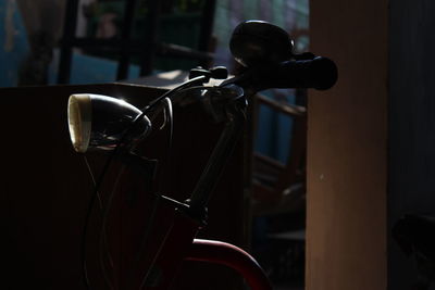 Close-up of bicycle on chair