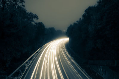 Light trails on road at night