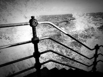 Full frame shot of railing against sea