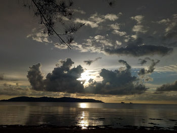 Scenic view of sea against sky at sunset