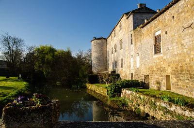 View of old building by canal