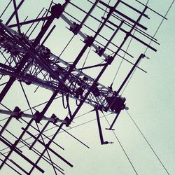 Low angle view of electricity pylon