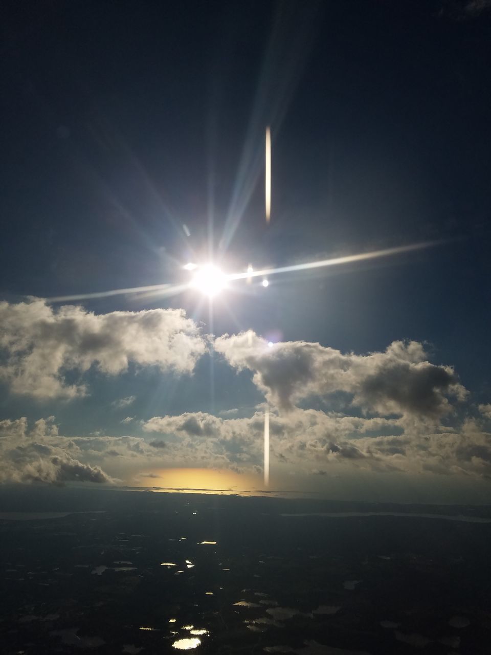 SCENIC VIEW OF SEA AGAINST BRIGHT SKY