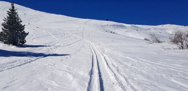 Snow covered mountain against sky