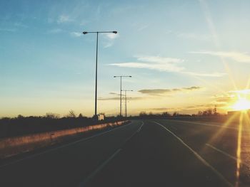 Road against sky during sunset