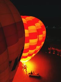 Hot air balloon against sky at night