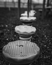 Close-up of tea cup on field