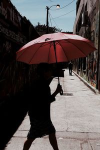 Full length of woman standing in city