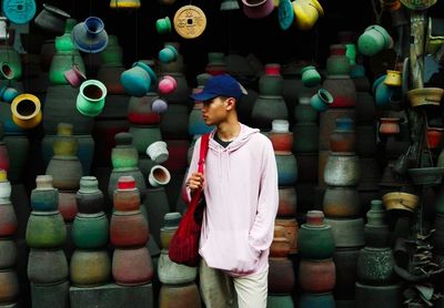 Full length of young man standing at market