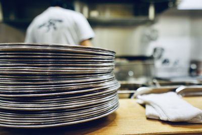 Close-up of metallic objects on table in restaurant