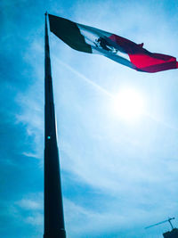 Low angle view of flag against sky