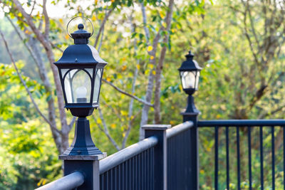 Close-up of street light against wall