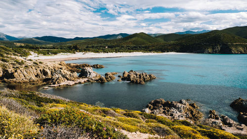 Scenic view of bay against sky