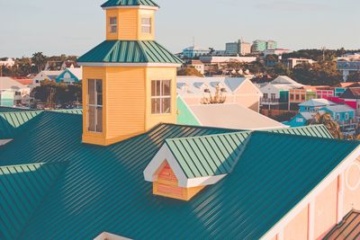 Multi colored cityscape against sky