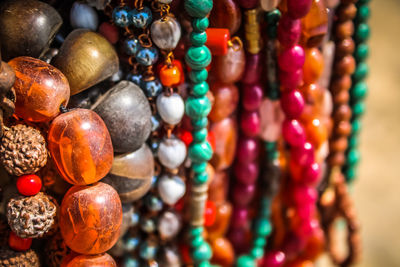 Close-up of multi colored jewelry for sale