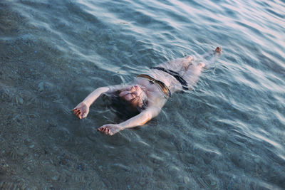 High angle view of person swimming in sea