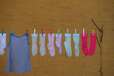 Close-up of socks drying on clothesline