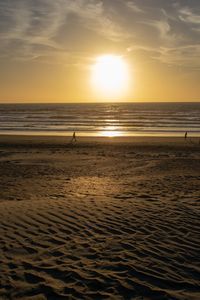 Scenic view of beach during sunset