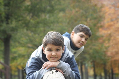 Side view of mother and daughter in park
