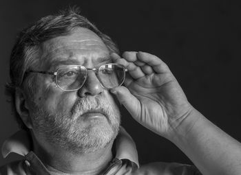 Close-up of thoughtful man looking away