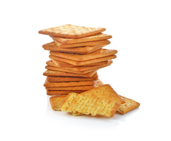 Close-up of cookies against white background