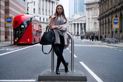 Full length of woman on city street