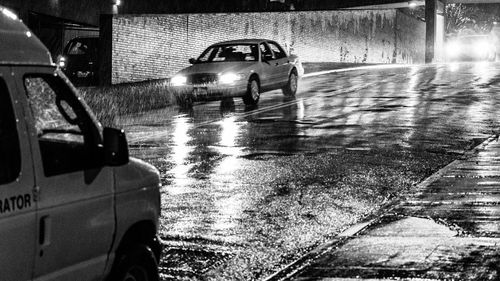 Reflection of car on side-view mirror