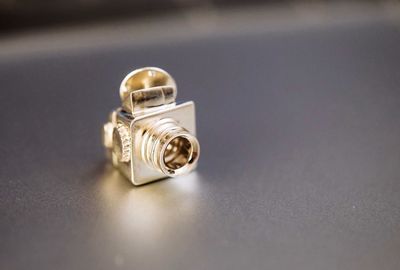 High angle view of wedding rings on table