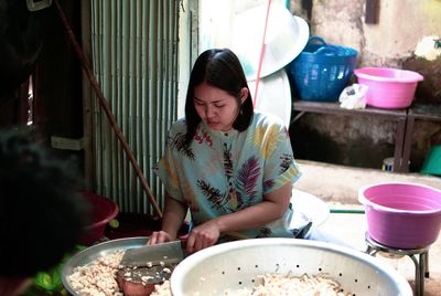 Woman preparing food at home