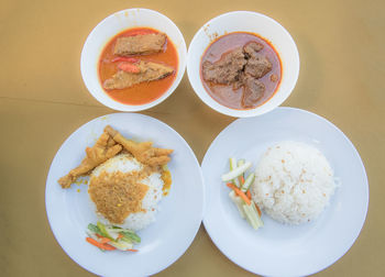 High angle view of food served on table