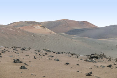 Scenic view of desert against clear sky