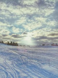 Scenic view of snow field against sky