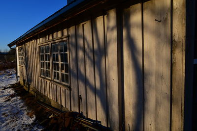 Abandoned train on window of old building