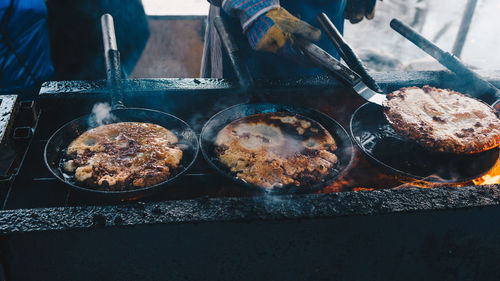 Midsection of person preparing food