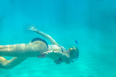 Man swimming in sea