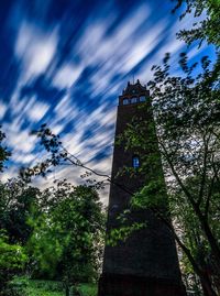 Low angle view of clock tower against sky