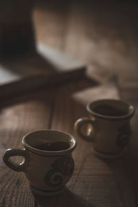 Close-up of coffee cup on table