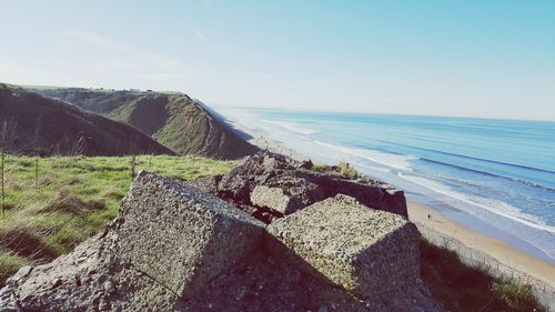 Scenic view of beach against clear sky