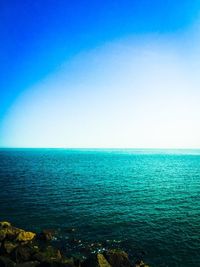 View of calm blue sea against clear sky