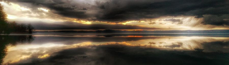 Scenic view of sea against cloudy sky