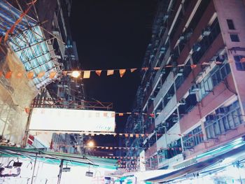 Buildings in city at night