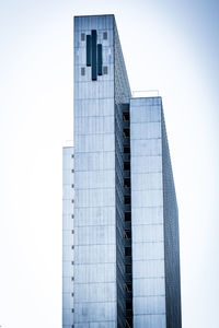 Low angle view of modern buildings against clear sky