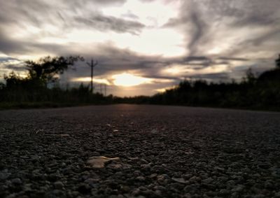 Scenic view of field against sky during sunset