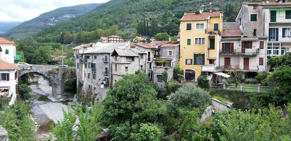 High angle view of houses and buildings in town