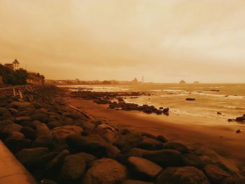 Scenic view of sea at sunset