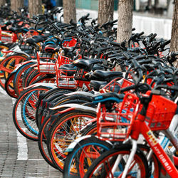 Close-up of bicycles parked on street