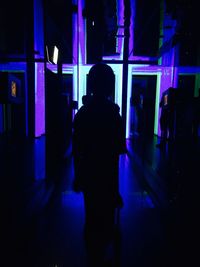 Blurred motion of man at night