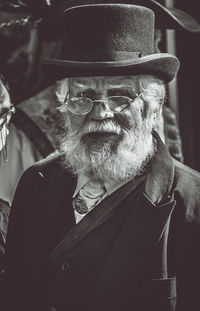 Portrait of senior man wearing hat